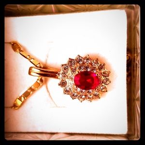 Rubi charm with Gucci chain set over gold